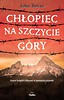 Chłopiec na szczycie góry